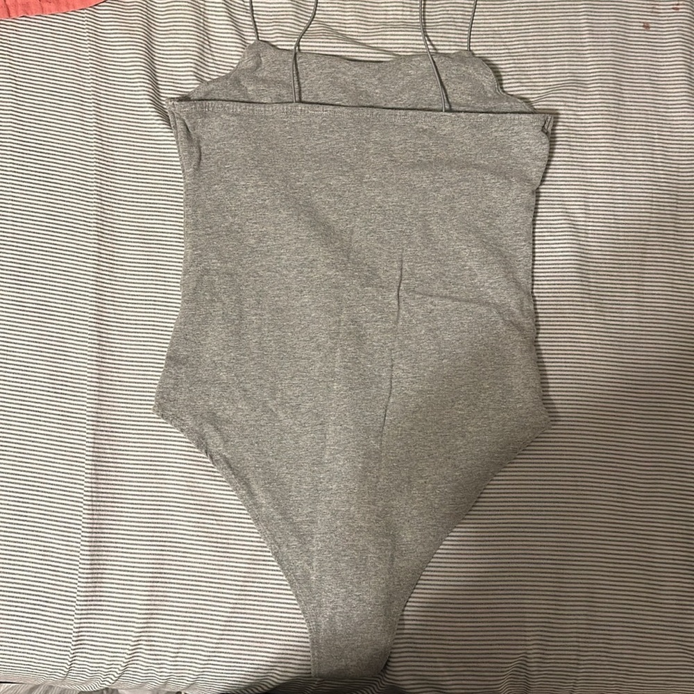 grey body suit